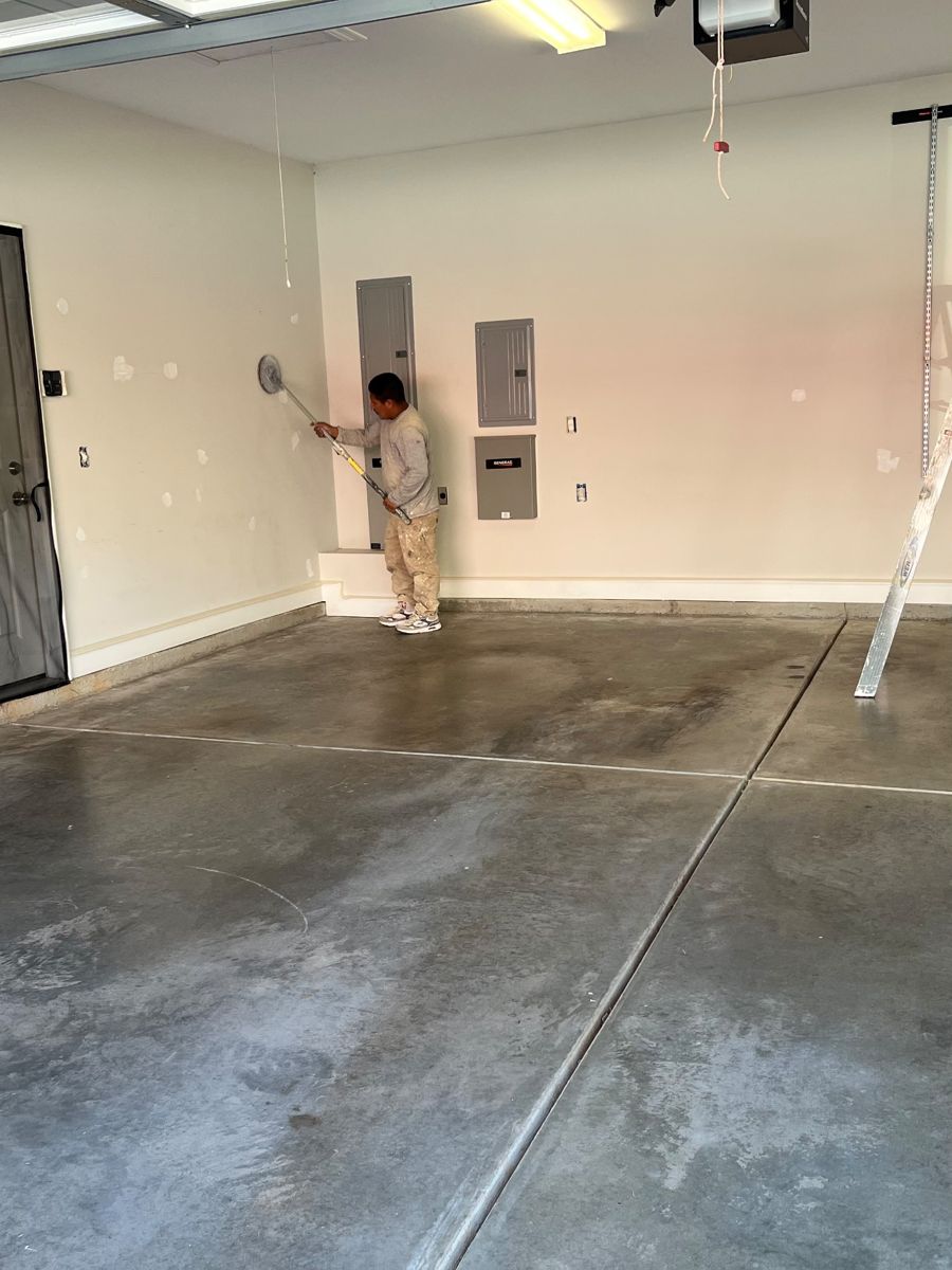 In progress: walls being painted in the emptied garage